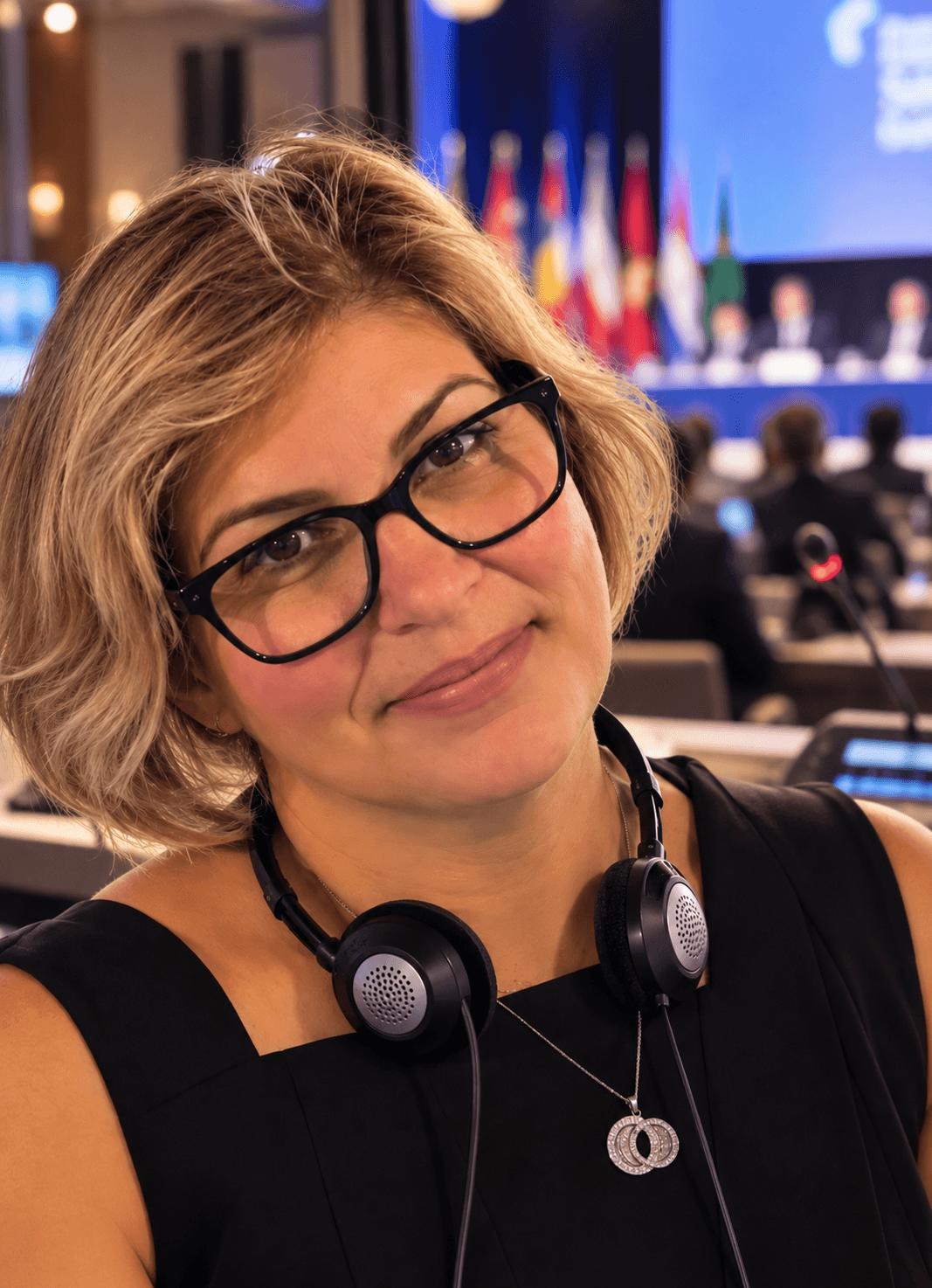 Andrea Xavier, Portuguese and English interpreter at an international convention
